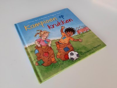 Boek met de titel: Kampioen op krukken