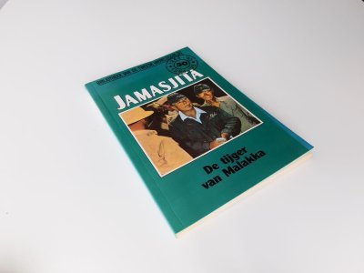 Tweedehands boek: Jamasjita - De tijger van Malakka nr 73 van auteur A.J. Barker - Paperback met rechte rug zonder leesvouwen. Kaft licht verkleurd, verder in goede conditie.