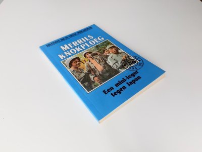 Boek met de titel: Merrils Knokploeg - Een mini-leger tegen Japan nr 77