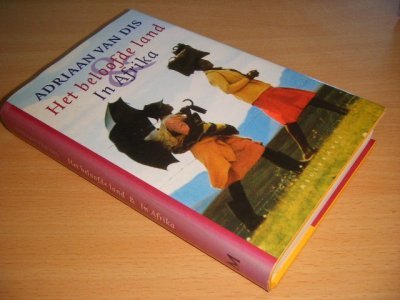Boek met de titel: Het beloofde land en In Afrika