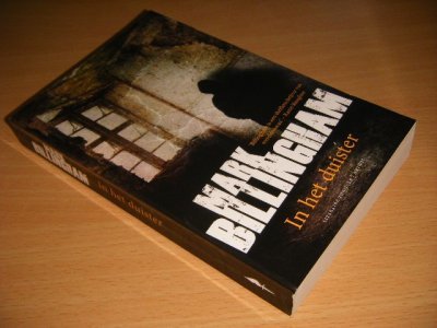 Boek met de titel: In het duister