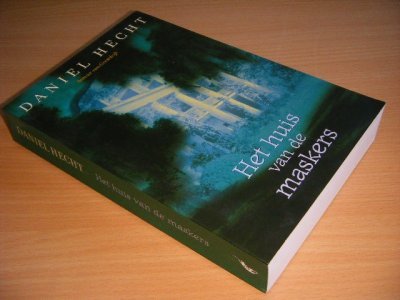 Boek met de titel: Het huis van de maskers