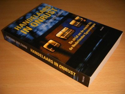 Boek met de titel: Handelaars in onrust