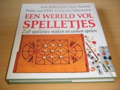 Tweedehands boek: Een wereld vol spelletjes van auteur Jack Botermans, Tony Burrett, Pieter van Delft, Carla van Splunteren - Gebonden met stofomslag, in goede staat. Geillustreerd.