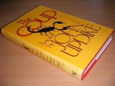 Tweedehands boek: The Coup van auteur John Updike - Hardcover with dustjacket, discoloured spine, in good condition.
