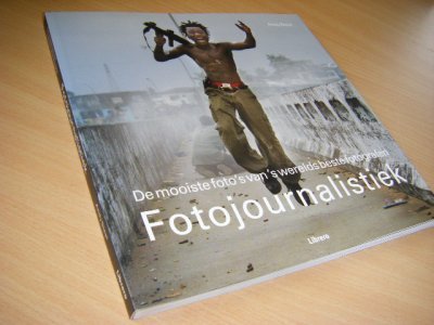 Tweedehands boek: Fotojournalistiek van auteur Andy Steel - Vierkantformaaat paperback, in zeer goede staat.
