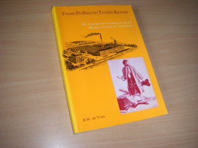 Tweedehands boek: From Pedlars to Textile Barons van auteur Vries, B. W. de  - Engelstalige paperback. Vouw achterkant kaft, verder in zeer goede staat. 