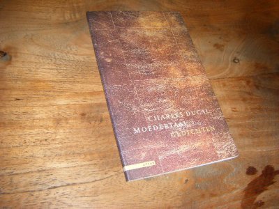 Tweedehands boek: Moedertaal van auteur Ducal, Charles  - Dunne paperback, als nieuw