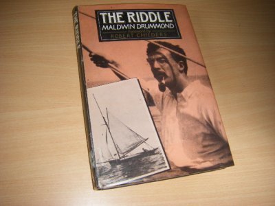 Tweedehands boek: The Riddle van auteur Maldwin Drummond - Ex-bibliotheek boek, in het Engels, omslag geplastificeerd aan boek vastgemaakt. In goede staat.