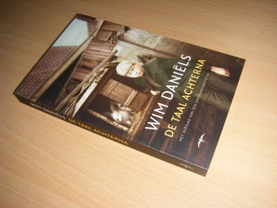 Tweedehands boek: De taal achterna van auteur Wim Daniëls - 