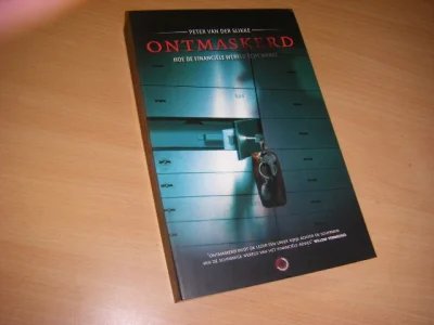 Boek met de titel: Ontmaskerd