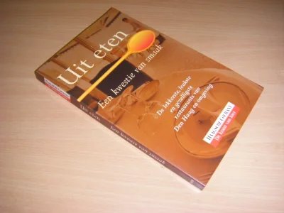 Boek met de titel: Uit eten . Een kwestie van smaak