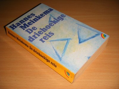 Boek met de titel: De driehoekige reis