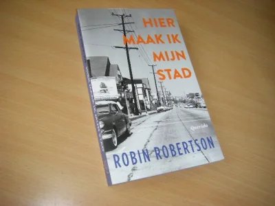 Boek met de titel: Hier maak ik mijn stad, of Een manier om trager te verliezen