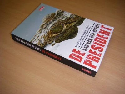Boek met de titel: De president