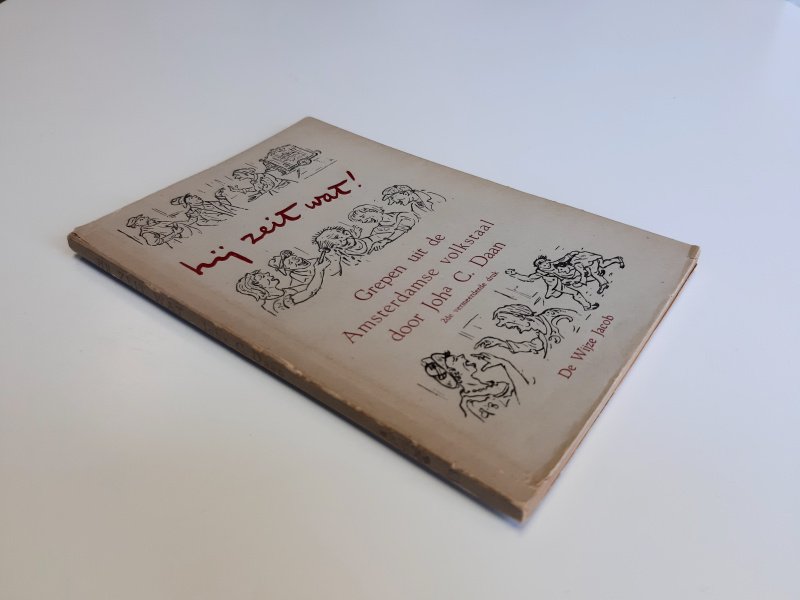 Boek met de titel: Hij zet wat! Grepen uit de Amsterdamse Volkstaal