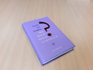 Boek met de titel: Wat doe ik hier in godsnaam