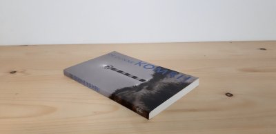 Boek met de titel: De dunne Komrij