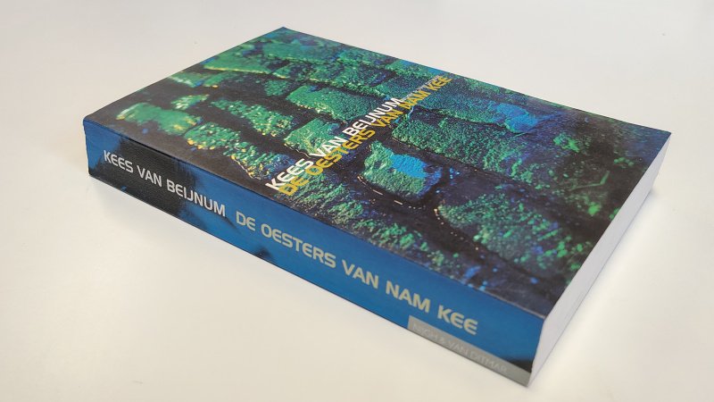 Boek met de titel: De oesters van Nam Kee