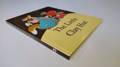 Boek met de titel: The Little Clay Hut