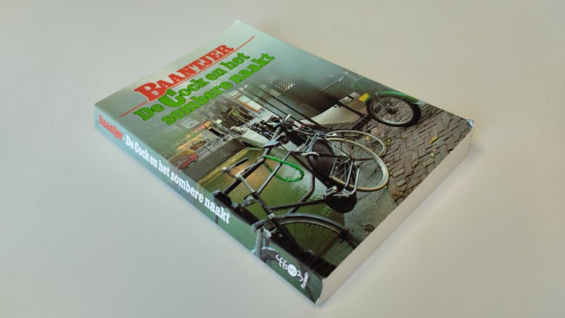 Tweedehands boek: De Cock en het sombere naakt van auteur A. C. Baantjer - Paperback, lichte gebruikssporen, gekromde rug, pagina's onbeschreven, netjes leesbaar exemplaar