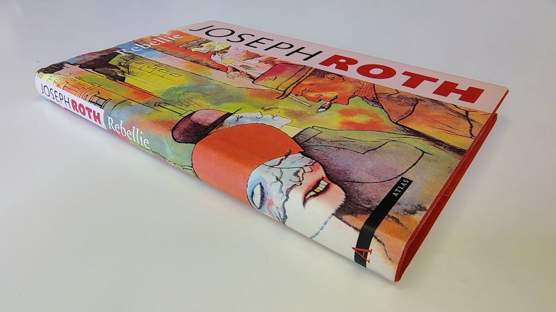 Tweedehands boek: Rebellie van auteur Joseph Roth - Hardcover met stofomslag. Kleine beschadiging omslag voorkant bovenaan, verder oogt het boek als nieuw. Binnenwerk ook onbeschreven en netjes.