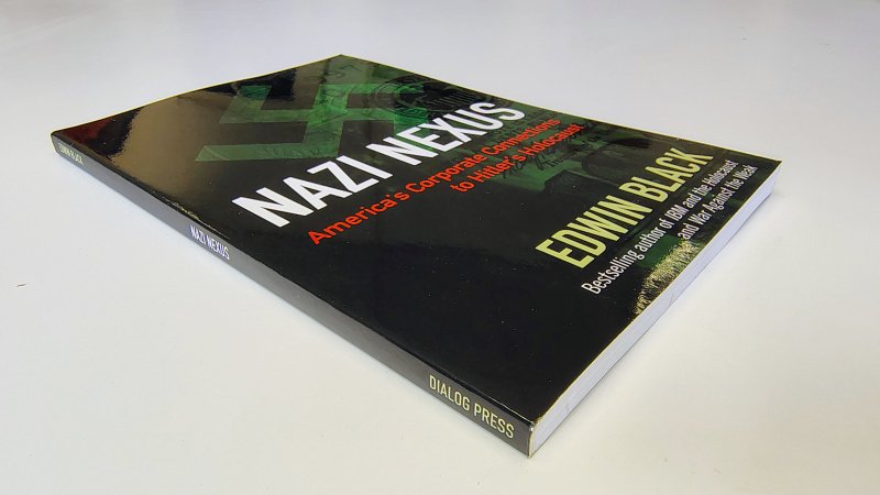 Tweedehands boek: Nazi Nexus van auteur Edwin Black - Engelstalige paperback minimale gebruikerssporen puntjes kaft. Binnenwerk als nieuw!