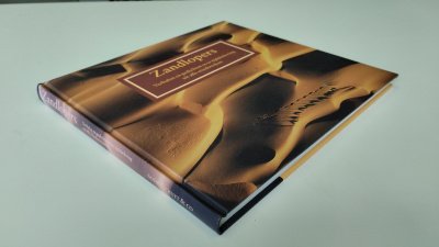Boek met de titel: Zandlopers