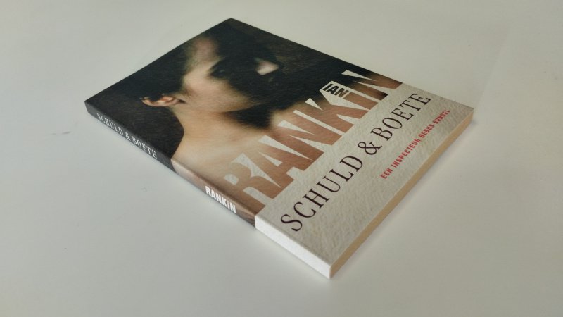 Tweedehands boek: Schuld & boete van auteur Ian James Rankin - In goede staat. Nederlandstalige paperback. Kaft heeft lichte gebruikerssporen. Pagina's netjes en schoon