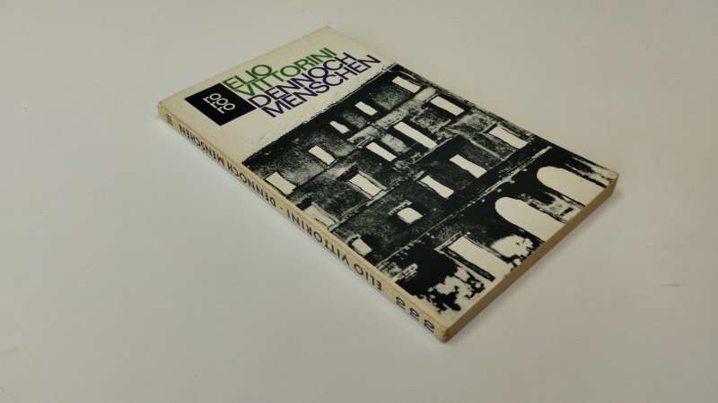 Tweedehands boek: Dennoch Menschen van auteur Elio Vittorini - In goede staat. Duitstalige paperback. Kaft licht verkleurd met lichte gebruikssporen. Pagina’s licht vergeeld maar netjes en stevig.