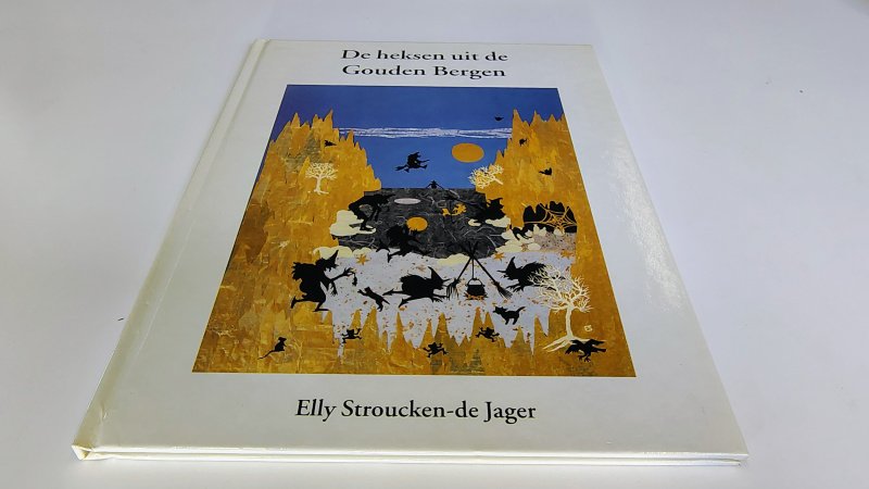 Tweedehands boek: De Heksen uit de Gouden Bergen van auteur Elly Stroucken de Jager - Hardcover als nieuw!
