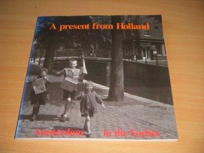 Tweedehands boek: A present from Holland van auteur Rob van Tongeren - Paperback, traces of use, in good condition. With illustrations.