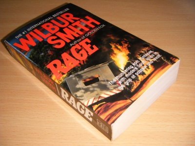 Tweedehands boek: Rage van auteur Wilbur Smith - Pocket, in excellent condition.