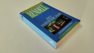 Boek met de titel: Het dertiende jaar