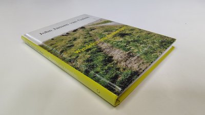 Boek met de titel: Wandelen om Amsterdam