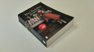Boek met de titel: Het familieportret