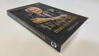 Boek met de titel: De gelukkigste man ter wereld