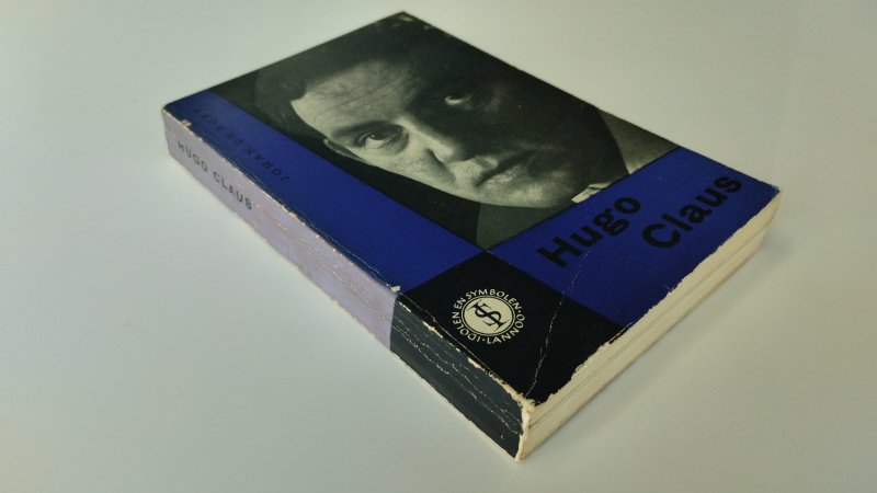 Tweedehands boek: Hugo Claus, een poreuze van man steen van auteur Johan de Roey - Redelijk – Nederlandstalige paperback. Kaft vertoon gebruikerssporen met name aan de randen en hoeken. leesvouw in de rug. Pagina's licht verkleurd, maar netjes en onbeschreven.