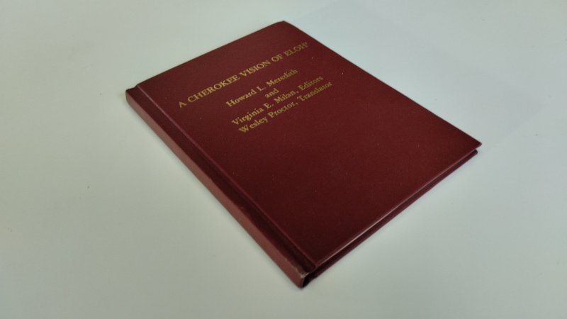 Tweedehands boek: A Cherokee Vision of Eloh' van auteur Howard L. Meredith, Virginia E. Milan, Wesley Proctor - In goede staat. Engels/ Cherokee -talige hardcover zonder stofomslag. Lichte gebruikssporen aan de kaft. Binnenwerk als nieuw.