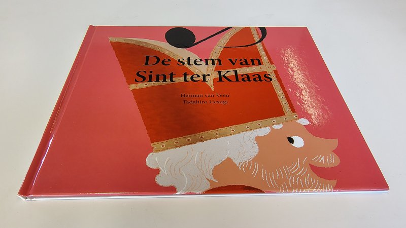 Tweedehands boek: De stem van Sinterklaas van auteur Herman van Veen en Tadahiro Uesugi - Hardcover, als nieuw!