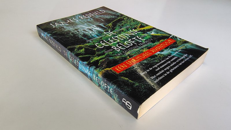 Tweedehands boek: De Celestijnse belofte,  een spiritueel avontuur van auteur James Redfield - Paperback met rechte rug zonder leesvouwen. Minimale gebruikerssporen randen kaft. Binnenwerk netjes en onbeschreven