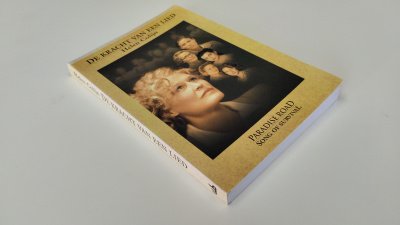 Boek met de titel: De kracht van een lied