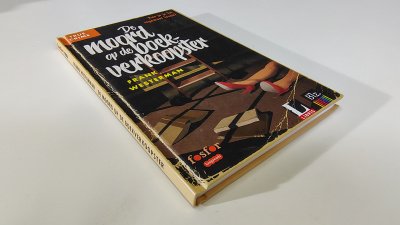Boek met de titel: De moord op de boekverkoopster