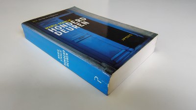 Boek met de titel: Honderd deuren