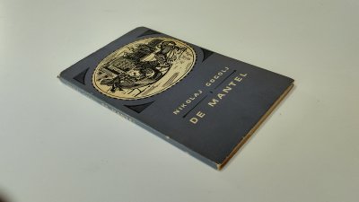 Boek met de titel: De mantel