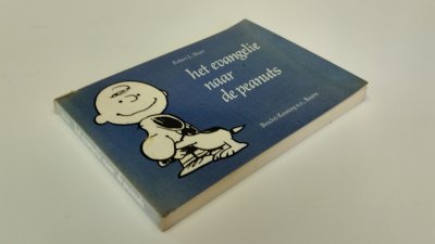 Boek met de titel: Het evangelie naar de peanuts