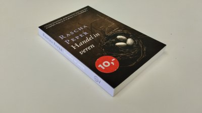 Boek met de titel: Handel in veren
