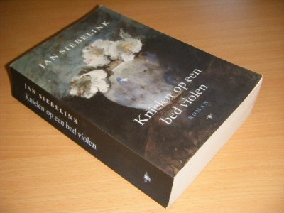 Boek met de titel: Knielen op een bed violen