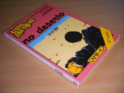 Boek met de titel: Uma aventura, No deserto