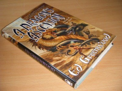 Tweedehands boek: A Dragon's Ascension van auteur Ed Greenwood - Hardcover with dustjacket, traces of use, in good condition.